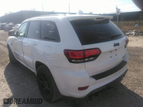 2020 Jeep Grand Cherokee Trackhawk z VIN 1C4RJFN94LC117596, wystawiony jako IAAI lot #36356989 z przebiegiem 37 994 mil mil oraz . Historia ofert i sprzedaży dostępna na DreamBid. Obrazek 3.