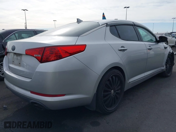 2013 Kia Optima LX with VIN KNAGM4A75D5430974, listed as a IAAI auction lot 41209055 with 197,871 mi miles. Bid and sale history available at carsss.com. Image 4.