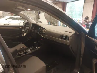 2021 Volkswagen Jetta S with VIN 3VWC57BU6MM087586, listed as a IAAI auction lot 42181804 with 61,931 mi miles and . Bid and sale history available at DreamBid. Image 5.
