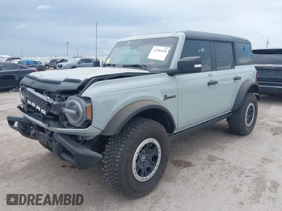 2022 Ford Bronco z VIN 1FMEE5DP3NLB31811, wystawiony jako IAAI lot #42303650 z przebiegiem 43 636 mil mil oraz . Historia ofert i sprzedaży dostępna na DreamBid. Obrazek 17.
