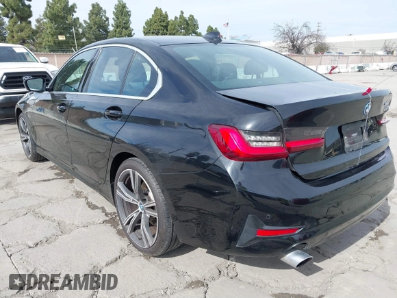 2022 BMW 3 Series 330e with VIN 3MW5P7J06N8C50460, listed as a IAAI auction lot 41688267 with 27,707 mi miles. Bid and sale history available at carsss.com. Image 3.