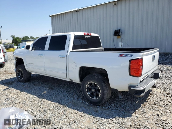 2016 Chevrolet Silverado 1500 LT with VIN 3GCUKREC9GG185402, listed as a Copart auction lot 52292115 with 131,861 mi miles and Salvage Title. Bid and sale history available at DreamBid. Image 2.
