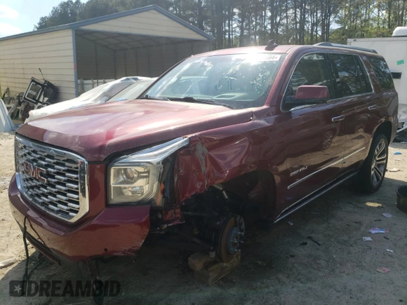 2018 GMC Yukon Denali with VIN 1GKS2CKJ1JR201871, listed as a Copart auction lot 52449594 with 82,761 mi miles and Salvage Title. Bid and sale history available at carsss.com. Image 1.