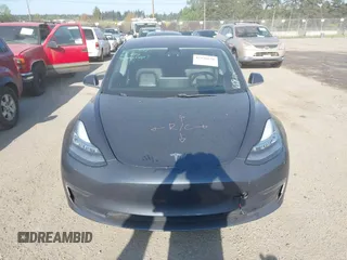 2018 Tesla Model 3 Long Range Battery with VIN 5YJ3E1EA1JF021139, listed as a IAAI auction lot 42116626 with 83,003 mi miles and . Bid and sale history available at DreamBid. Image 12.