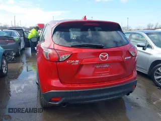 2015 Mazda CX-5 Grand Touring with VIN JM3KE4DY7F0477770, listed as a IAAI auction lot 41617849 with 106,135 mi miles. Bid and sale history available at carsss.com. Image 17.