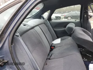 1999 Ford Taurus SE z VIN 1FAFP53U4XG150881, wystawiony jako Copart lot #40964564 z przebiegiem 124 928 mil mil oraz Tytuł czysty. Historia ofert i sprzedaży dostępna na DreamBid. Obrazek 10.