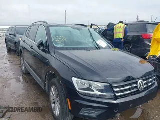 2018 Volkswagen Tiguan SEL z VIN 3VV3B7AX9JM068003, wystawiony jako IAAI lot #41917511 z przebiegiem 75 656 mil mil oraz . Historia ofert i sprzedaży dostępna na DreamBid. Obrazek 1.