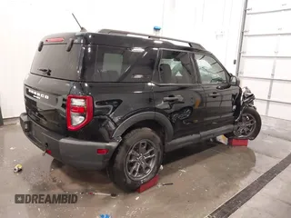 2021 Ford Bronco Sport Big Bend z VIN 3FMCR9B62MRA26576, wystawiony jako IAAI lot #42041497 z przebiegiem 28 333 mil mil oraz . Historia ofert i sprzedaży dostępna na DreamBid. Obrazek 4.