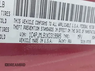 2019 Jeep Cherokee Latitude Plus with VIN 1C4PJMLB1KD319905, listed as a IAAI auction lot 41143311 with 98,694 mi miles. Bid and sale history available at carsss.com. Image 9.