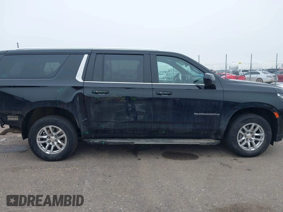 2024 Chevrolet Suburban LT z VIN 1GNSKCKD1RR242476, wystawiony jako IAAI lot #41577855 z przebiegiem 24 285 mil mil oraz . Historia ofert i sprzedaży dostępna na DreamBid. Obrazek 13.