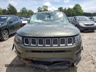 2021 Jeep Compass Sport with VIN 3C4NJDAB7MT598591, listed as a Copart auction lot 56057145 with 77,215 mi miles and Salvage title. Bid and sale history available at DreamBid. Image 5.
