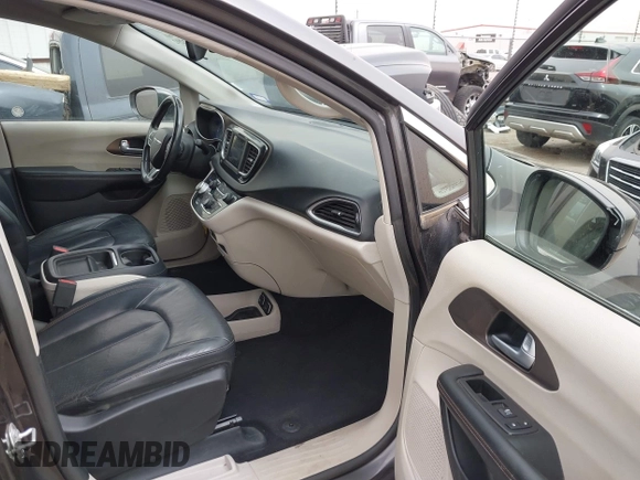 2018 Chrysler Pacifica Touring L with VIN 2C4RC1BG2JR116273, listed as a IAAI auction lot 41922292 with 125,159 mi miles and . Bid and sale history available at DreamBid. Image 5.