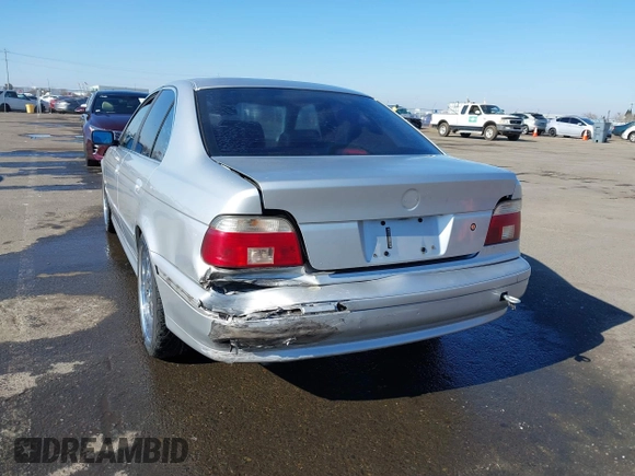 2003 BMW 5 Series 525i with VIN WBADT33473GF43821, listed as a IAAI auction lot 41450822 with 165,062 mi miles. Bid and sale history available at carsss.com. Image 6.