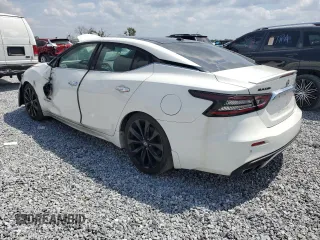 2017 Nissan Maxima SV with VIN 1N4AA6AP9HC409890, listed as a Copart auction lot 55473195 with 104,518 mi miles and Clean Title. Bid and sale history available at DreamBid. Image 2.