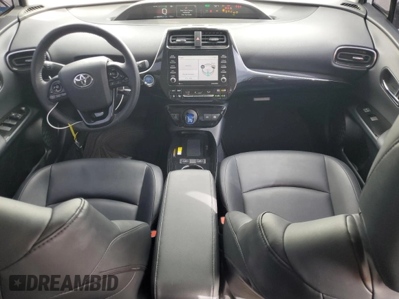 2021 Toyota Prius L Eco with VIN JTDKAMFUXM3149396, listed as a Copart auction lot 61874195 with 126,473 mi miles and Salvage title. Bid and sale history available at DreamBid. Image 8.