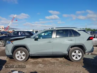 2021 Toyota RAV4 XLE with VIN 2T3W1RFV6MW163395, listed as a IAAI auction lot 42455461 with 65,840 mi miles and . Bid and sale history available at DreamBid. Image 14.