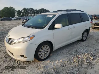 2011 Toyota Sienna XLE with VIN 5TDDK3DC1BS011963, listed as a Copart auction lot 54951565 with 196,868 mi miles and Salvage title. Bid and sale history available at DreamBid. Image 1.