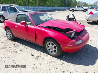 1996 Mazda MX-5 Miata z VIN JM1NA3537T0715952, wystawiony jako IAAI lot #42033690 z przebiegiem 56 520 mil mil oraz . Historia ofert i sprzedaży dostępna na DreamBid. Obrazek 1.