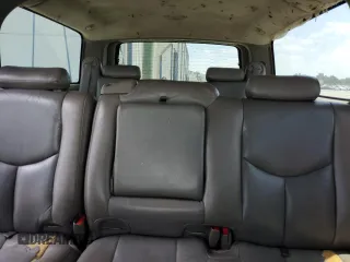 2005 Chevrolet Suburban LT z VIN 3GNEC16Z15G280353, wystawiony jako Copart lot #53974785 z przebiegiem 389 849 mil mil oraz Nie do naprawy. Historia ofert i sprzedaży dostępna na DreamBid. Obrazek 10.