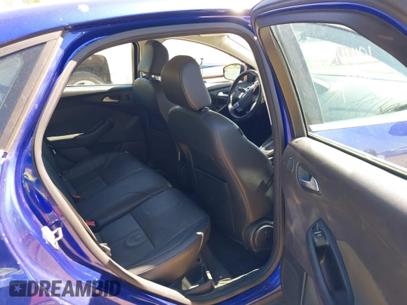 2015 Ford Focus Titanium with VIN 1FADP3J20FL304828, listed as a IAAI auction lot 42144101 with 199,715 mi miles and . Bid and sale history available at carsss.com. Image 8.