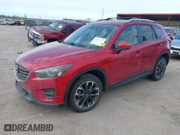 2016 Mazda CX-5 Grand Touring with VIN JM3KE4DY8G0729446, listed as a IAAI auction lot 41871207 with 89,258 mi miles. Bid and sale history available at carsss.com. Image 18.