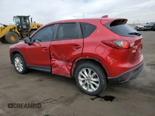 2014 Mazda CX-5 Grand Touring with VIN JM3KE4DY5E0360896, listed as a Copart auction lot 43978975 with 113,942 mi miles and Salvage Title. Bid and sale history available at carsss.com. Image 2.