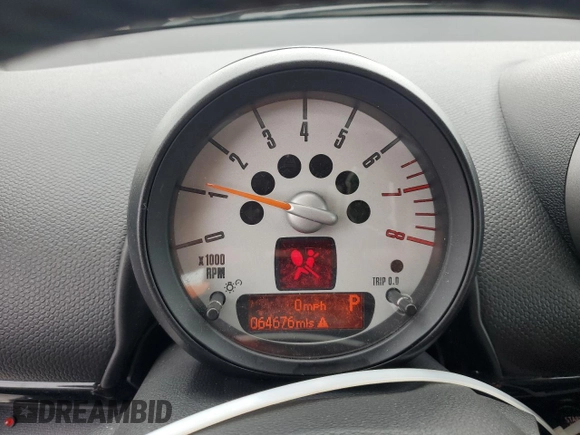 2012 MINI Countryman with VIN WMWZB3C5XCWM06778, listed as a Copart auction lot 61201285 with 64,676 mi miles and Salvage title. Bid and sale history available at DreamBid. Image 9.