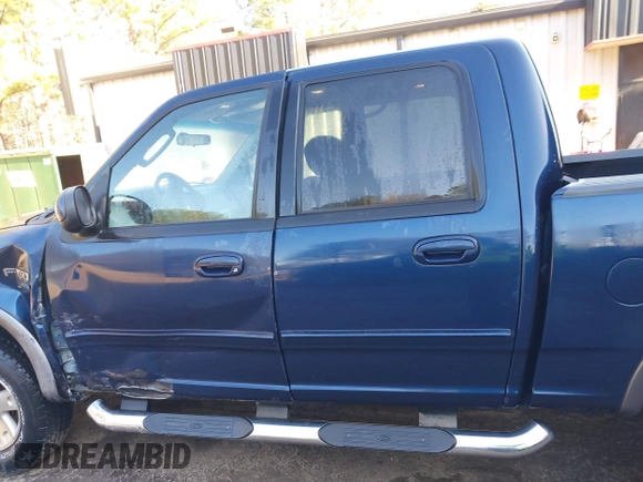 2002 Ford F-150 XLT with VIN 1FTRW086X2KE17566, listed as a IAAI auction lot 41721236 with 98,524 mi miles. Bid and sale history available at carsss.com. Image 14.