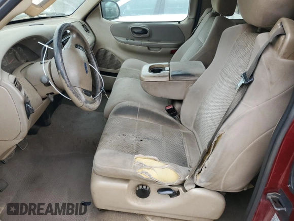 2003 Ford F-150 XL with VIN 1FTRX17L63NA96989, listed as a Copart auction lot 51501945 with 297,669 mi miles and Salvage Title. Bid and sale history available at carsss.com. Image 7.