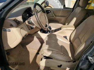 2001 Mercedes-Benz M 320/430/500 with VIN 4JGAB54E41A272057, listed as a Copart auction lot 58197965 with 150,829 mi miles and Salvage title. Bid and sale history available at DreamBid. Image 7.