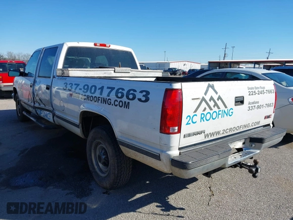 1999 GMC Sierra 3500 z VIN 1GTGC33R4XF094778, wystawiony jako IAAI lot #41229630 z przebiegiem 199 345 mil mil oraz . Historia ofert i sprzedaży dostępna na DreamBid. Obrazek 3.