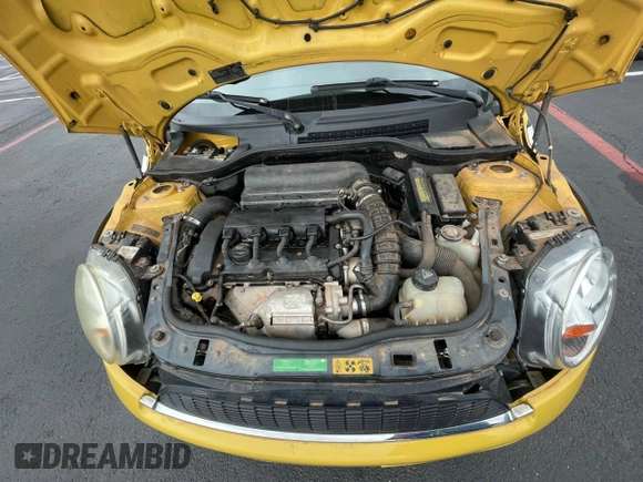 2007 MINI Hardtop S with VIN WMWMF73507TL90586, listed as a Copart auction lot 44470675 with 50,695 mi miles and Clean Title. Bid and sale history available at DreamBid. Image 7.