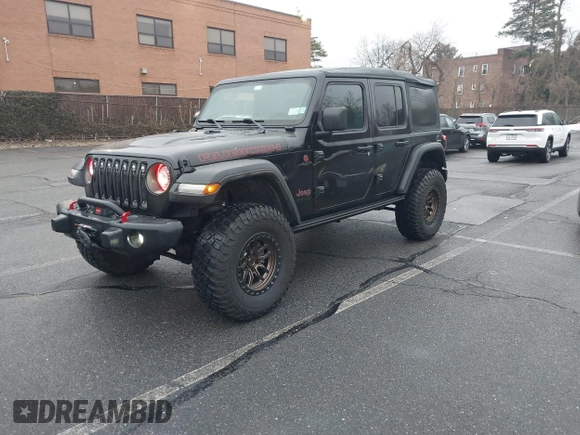 2022 Jeep Wrangler Unlimited Rubicon with VIN 1C4HJXFGXNW127064, listed as a IAAI auction lot 41491203 with 47,700 mi miles and . Bid and sale history available at DreamBid. Image 2.
