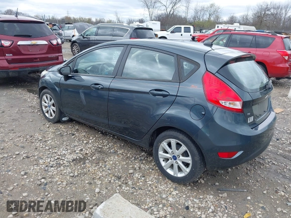 2011 Ford Fiesta SE with VIN 3FADP4EJ4BM228417, listed as a IAAI auction lot 42061494 with 86,873 mi miles. Bid and sale history available at carsss.com. Image 3.