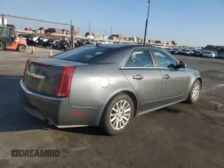 2010 Cadillac CTS with VIN 1G6DA5EG0A0133864, listed as a Copart auction lot 42970405 with 123,946 mi miles and Salvage Title. Bid and sale history available at DreamBid. Image 3.