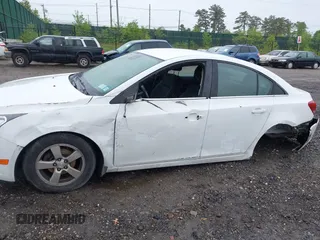 2014 Chevrolet Cruze 1LT with VIN 1G1PC5SB6E7233051, listed as a IAAI auction lot 42214334 with 88,389 mi miles and . Bid and sale history available at DreamBid. Image 6.