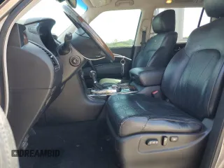 2012 Infiniti QX56 7-passenger with VIN JN8AZ2NE2C9015890, listed as a Copart auction lot 52685655 with 159,226 mi miles and Salvage title. Bid and sale history available at DreamBid. Image 7.