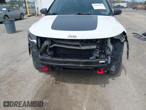 2017 Jeep Compass Trailhawk with VIN 3C4NJDDBXHT500588, listed as a IAAI auction lot 42060556 with 76,788 mi miles and . Bid and sale history available at DreamBid. Image 6.