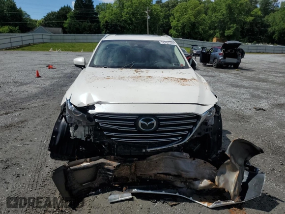 2019 Mazda CX-9 Touring z VIN JM3TCBCY9K0305038, wystawiony jako Copart lot #56707735 z przebiegiem 76 546 mil mil oraz Szkoda całkowita • Salvage title. Historia ofert i sprzedaży dostępna na DreamBid. Obrazek 5.