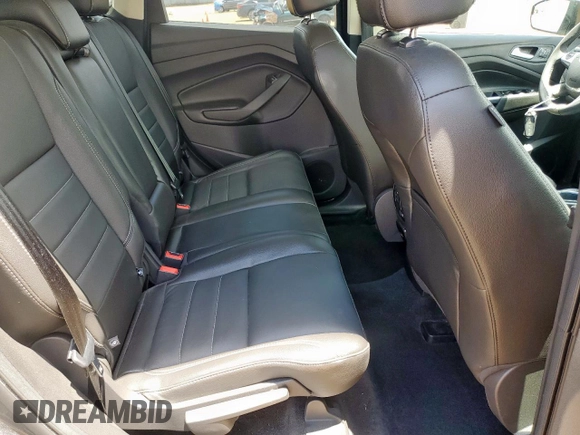 2015 Ford Escape Titanium with VIN 1FMCU0J92FUB80769, listed as a Copart auction lot 61988435 with 103,212 mi miles and Salvage title. Bid and sale history available at DreamBid. Image 11.