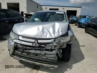 2016 Mitsubishi Outlander ES with VIN JA4AD2A39GZ011172, listed as a Copart auction lot 58392435 with 165,114 mi miles and Salvage title. Bid and sale history available at DreamBid. Image 14.