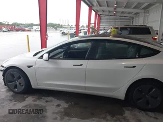 2023 Tesla Model 3 with VIN 5YJ3E1EA9PF548726, listed as a IAAI auction lot 42345157 with 30,647 mi miles and . Bid and sale history available at DreamBid. Image 15.