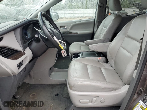 2015 Toyota Sienna XLE with VIN 5TDYK3DC0FS686792, listed as a Copart auction lot 57472045 with 222,663 mi miles and Salvage title. Bid and sale history available at DreamBid. Image 7.