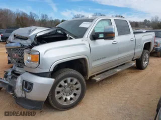 2017 GMC Sierra 2500HD Denali with VIN 1GT12UEY8HF216479, listed as a IAAI auction lot 41678315 with 127,057 mi miles. Bid and sale history available at carsss.com. Image 17.