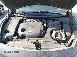 2014 Nissan Maxima SV with VIN 1N4AA5AP8EC451098, listed as a IAAI auction lot 42520957 with 146,924 mi miles and . Bid and sale history available at DreamBid. Image 10.