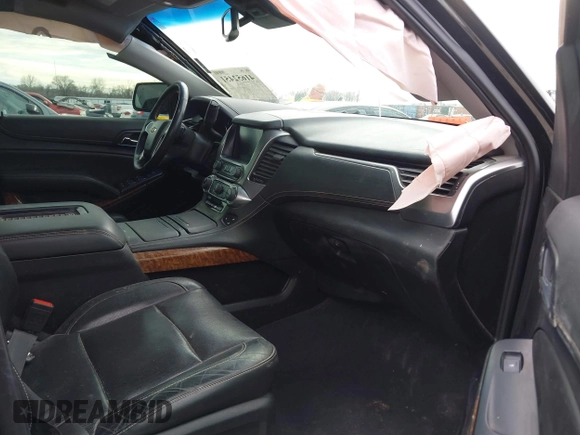 2019 Chevrolet Suburban Premier with VIN 1GNSKJKC7KR261826, listed as a IAAI auction lot 41652451 with 127,032 mi miles and . Bid and sale history available at DreamBid. Image 5.