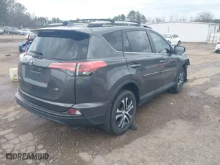 2018 Toyota RAV4 LE with VIN 2T3ZFREV9JW453996, listed as a IAAI auction lot 41499826 with 105,167 mi miles. Bid and sale history available at carsss.com. Image 4.