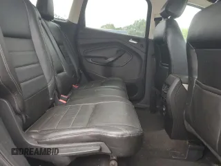 2013 Ford Escape SEL z VIN 1FMCU9HX7DUC11052, wystawiony jako Copart lot #62377515 z przebiegiem 225 704 mil mil oraz Szkoda całkowita • Salvage title. Historia ofert i sprzedaży dostępna na DreamBid. Obrazek 11.