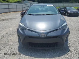 2019 Toyota Corolla L z VIN 5YFBURHE4KP869548, wystawiony jako Copart lot #59943055 z przebiegiem 155 099 mil mil oraz Czysty tytuł • Clean title. Historia ofert i sprzedaży dostępna na DreamBid. Obrazek 5.