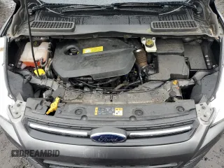 2014 Ford Escape SE z VIN 1FMCU9GXXEUB83184, wystawiony jako Copart lot #56188305 z przebiegiem 100 786 mil mil oraz Czysty tytuł • Clean title. Historia ofert i sprzedaży dostępna na DreamBid. Obrazek 11.
